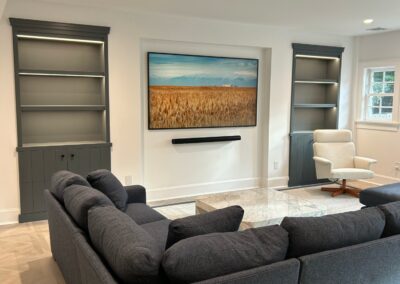 Basement living room recessed lighting and built-in installation in Morristown NJ